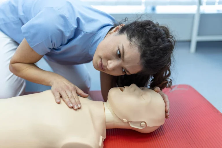 cpr-class-with-instructors-talking-demonstrating-firt-aid-compressions-ans-reanimation-procedure-cpr-dummy_657921-335